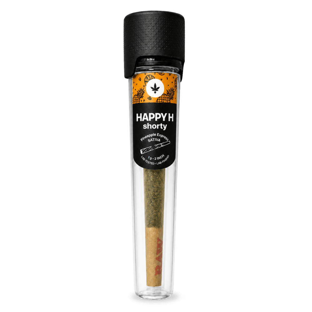 „Happy H Shorties – Pineapple Express | CBDX-dúsított előre sodort cigaretta – 10db” feliratú, előre sodort cigaretta egy fekete kupakos, átlátszó műanyag csőben. A címke narancssárga és fekete színű, és jelzi, hogy sativa fajtáról van szó. A cigaretta RAW szűrővel van ellátva.