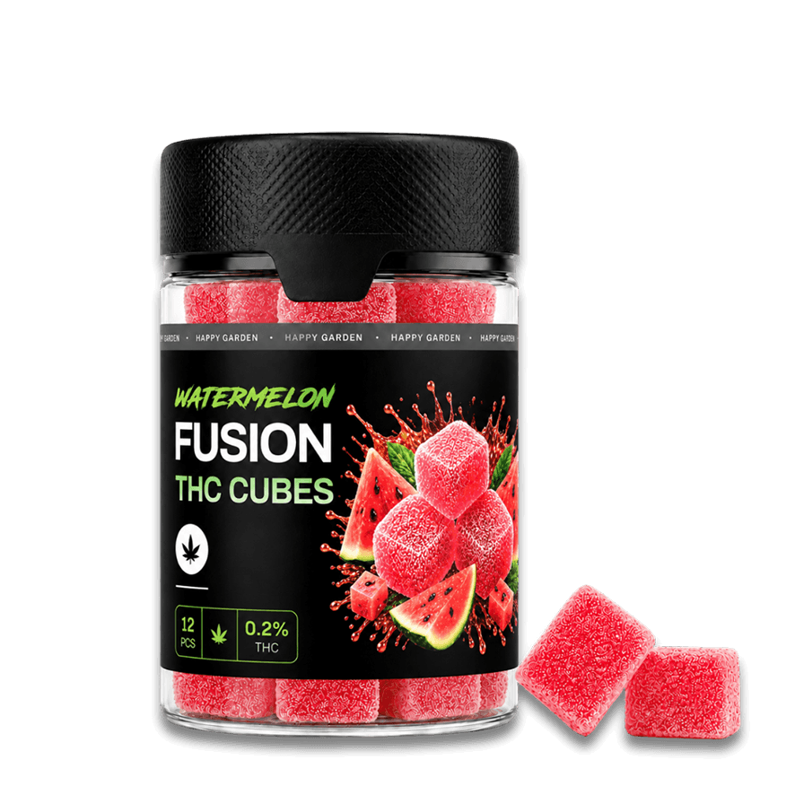Egy „Happy H Gummies Görögdinnye – 10 mg / db – Strong Edition, 12 db” feliratú üvegben piros, cukorral bevont görögdinnye-ízű gumicukrok láthatók. Az üveg mellett két gumicukor fekszik, a címke pedig azt jelzi, hogy összesen 12 darab van benne.
